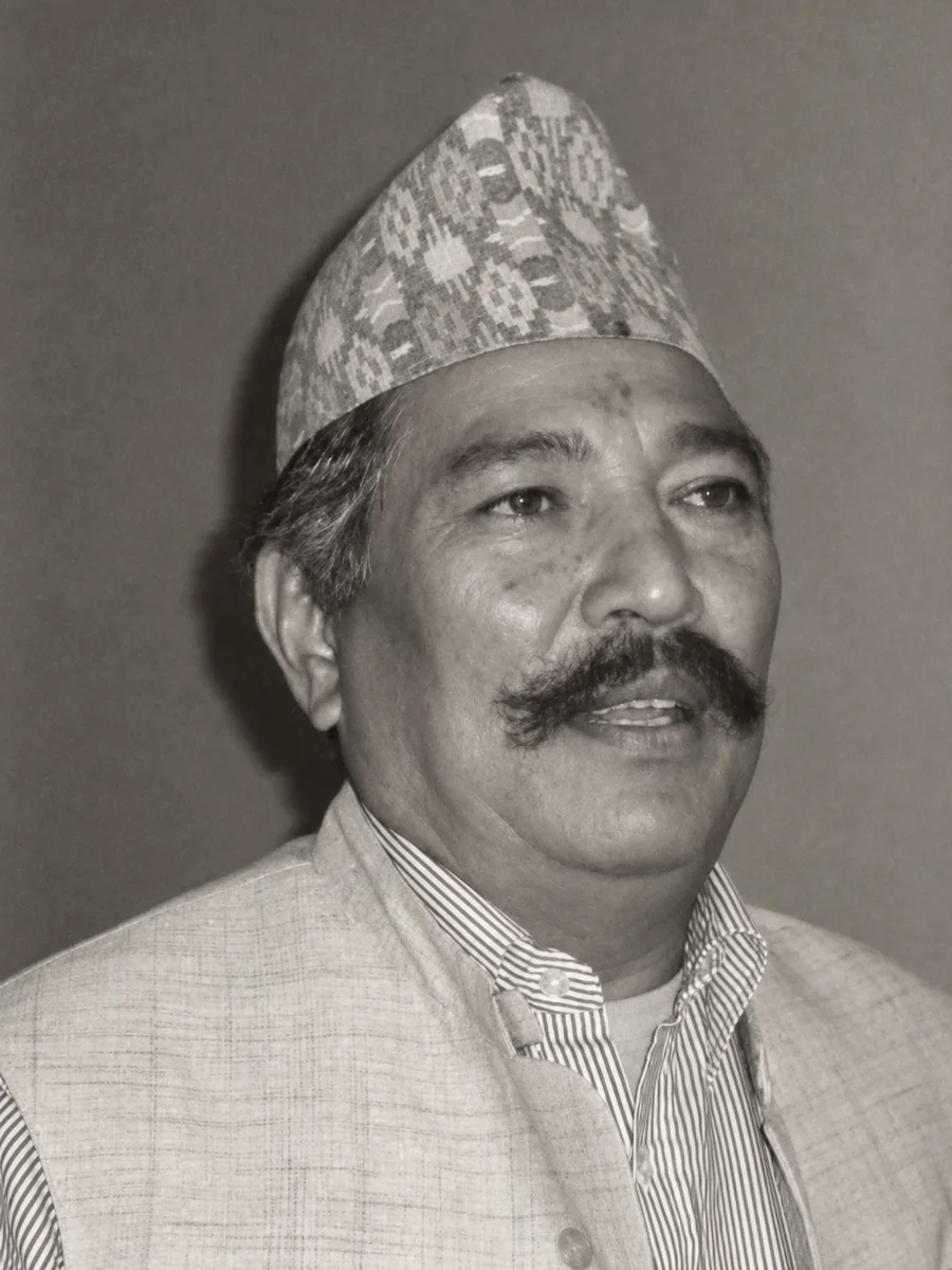 Portrait of the founder of Manaram Group in a traditional dhaka topi